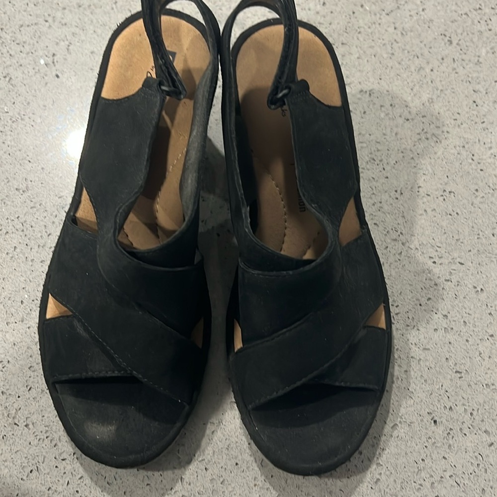 Collection by Clark’s.  Black faux suede heal with full cushioned insole